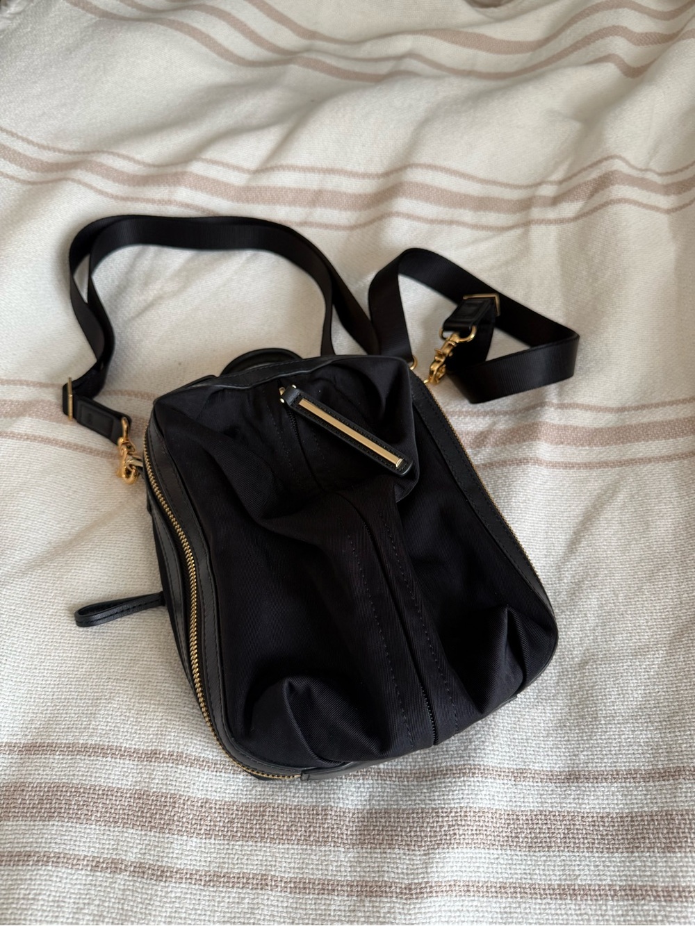 CARAA studio 2 mini crossbody in black and gold